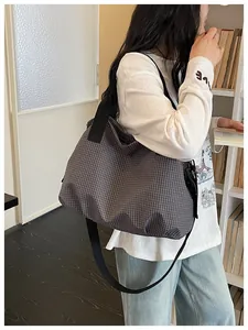 Large capacity checkered nylon tote bag perfect for daily commuting school and travel use