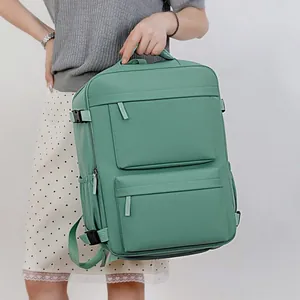 Grande zaino per laptop da viaggio verde menta con modella, stile business