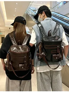 Back view of stylish retro glossy faux leather backpacks in brown and black color options