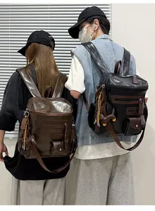 Vintage PU leather motorcycle backpack shown on models in brown and black colors