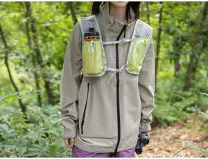 Lightweight lime green outdoor hiking hydration vest shown in a natural forest environment