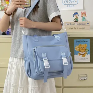 Bolso escolar azul claro simple de gran capacidad para niñas con estilo versátil