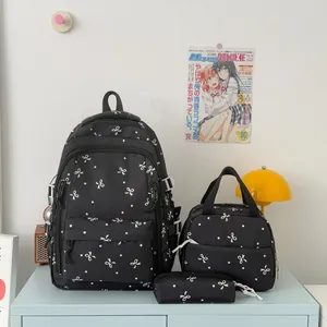 Ensemble sac à dos 3 pièces élégant noir avec motifs de nœuds blancs mignons pour étudiantes