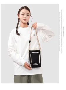 Chic black crossbody phone bag with colorful braided strap for outdoor activities