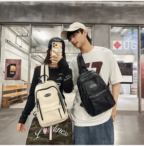 Lifestyle shot of minimalist backpacks in black and cream for students and travelers
