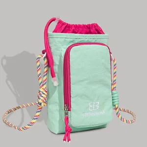 Mint green outdoor phone crossbody bag with pink drawstring and colorful rope strap