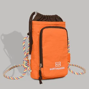 Vibrant orange outdoor crossbody water bottle and phone bag with a colorful rope strap