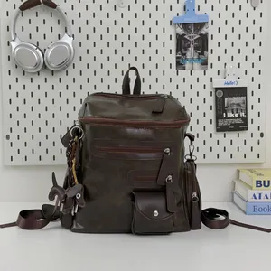 Vintage brown PU leather motorcycle backpack for women with stylish multiple zip pockets