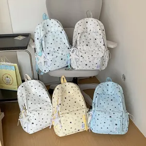 Stylish star print backpacks in multiple colors for high school and college students.