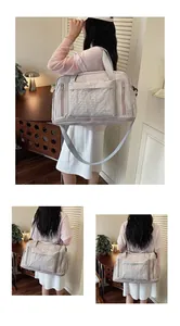 Model showcasing the large capacity and stylish design of the versatile travel bag