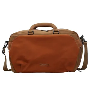 Minimalist outdoor sports travel duffle bag with orange panel and adjustable shoulder strap