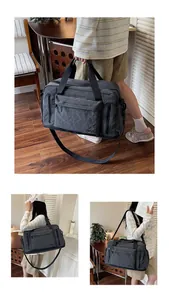 Large capacity grey plaid travel bag shown in hand-carry and shoulder-carry styles
