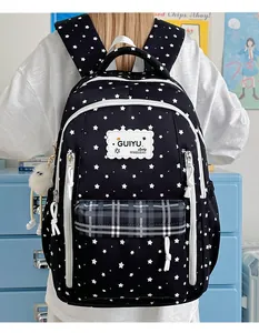 Fashionable black star pattern student backpack with plaid pocket and plush charm
