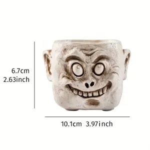 Détail du pot de succulentes en résine visage démon avec dimensions en cm et pouces.