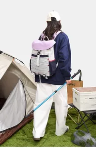 Rear view of a minimalist outdoor hiking backpack in color-block design for travel.