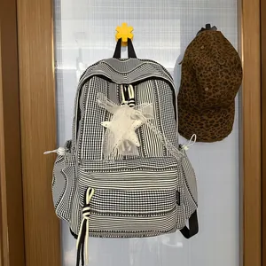 Korean style checkered school backpack for girls with a decorative star mesh pendant