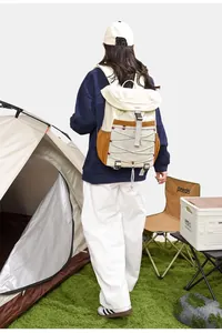 Professional outdoor hiking backpack for women shown in a realistic camping scene with tent