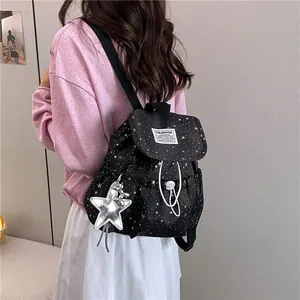 Lightweight Japanese style mini backpack for women with white star pattern and star charm