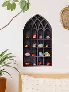 Detailed macro view of cathedral style gothic arch wooden wall shelf for crystals