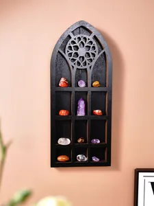 Gothic cathedral window style wooden wall shelf displaying various healing crystals