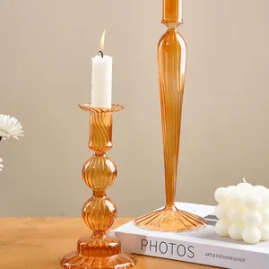 Amber ribbed glass candle holders for elegant wedding and festival table setting
