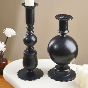 Elegant minimalist matte black glass candle holders for festive table centerpiece