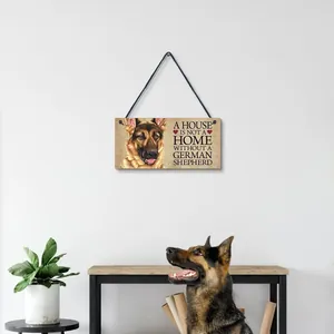 Wooden home decor sign featuring a German Shepherd illustration hanging on a white wall