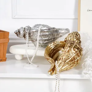 Elegant gold and silver conch resin vases for luxury nautical home decor accents