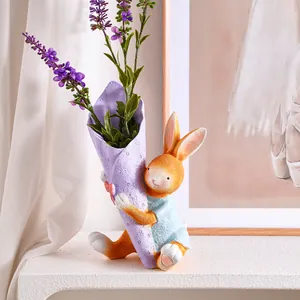Cute resin rabbit flower vase holding a lavender bouquet for creative Easter home decoration