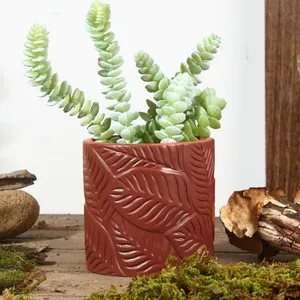 Nordischer Blumentopf aus Harz mit Blattrelief für Zimmerpflanzen und Sukkulenten.