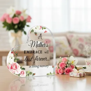 Detail of heart-shaped acrylic plaque with Mother's Day floral design and inscription