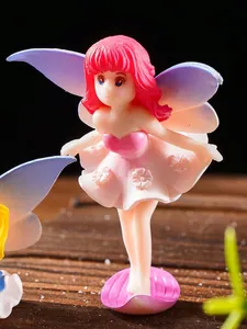 Macro view of cute winged fairy figurine for miniature garden and bonsai decoration