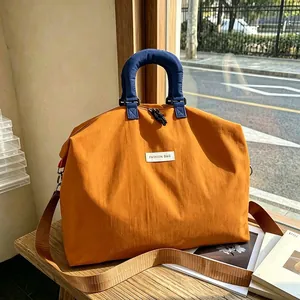 Borsa da viaggio arancione minimalista di grande capacità per sport e fine settimana