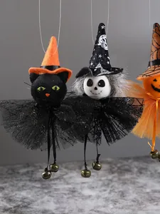 Close-up detail of Halloween hanging ornaments featuring black cat and skeleton witch doll