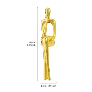 Detailed dimension view of creative gold abstract thinker figurine for home decoration