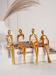Ensemble de 4 statues dorées de penseurs abstraits pour une décoration de bureau moderne