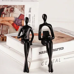 Ensemble de 2 sculptures de personnages abstraits noirs pour décoration