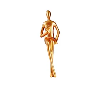 Sculpture abstraite moderne dorée de figure humaine décoration intérieure posture assise