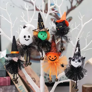 Halloween hanging ornaments featuring ghost, witch, and pumpkin characters on a white tree.