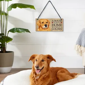 Wooden pet wall plaque with Golden Retriever art hanging in a living room.