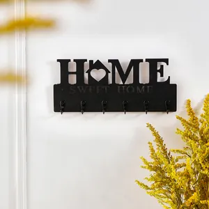 Dekorative Wandgarderobe aus schwarzem Holz mit HOME SWEET HOME Design für Zuhause