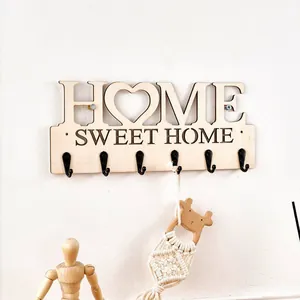 Kreativer Wandhaken aus Holz mit HOME-Schriftzug für stilvolle Heimdekoration und Ordnung