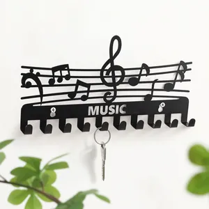 Minimalistischer Wand-Schlüsselhalter aus Eisen mit Noten-Design Detailansicht für die Wand