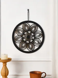 Bohemian wooden wall hanging decor, black carved circular floral mandala art piece for home.