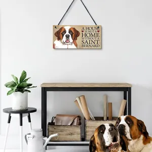 Vintage Saint Bernard wooden wall sign hanging in a cozy home interior with real dogs.