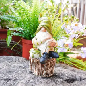 Detailed close-up of a colorful resin gnome figurine sitting on a tree stump in a garden