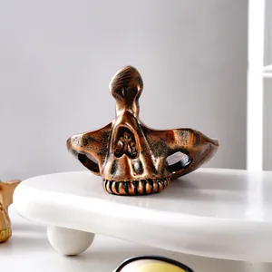 Portaocchiali in resina a forma di teschio in bronzo antico per decorazione da scrivania