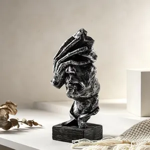 Moderna escultura abstracta de busto humano con acabado metálico para escritorio