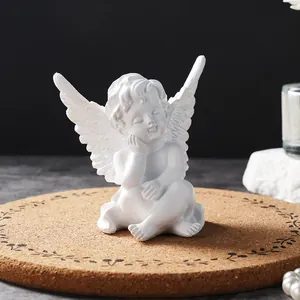 Detailed macro shot of a white resin angel figurine for Nordic style home decor