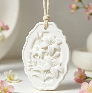 Macro detail view of elegant white lily flower embossed plaster aroma diffuser stone